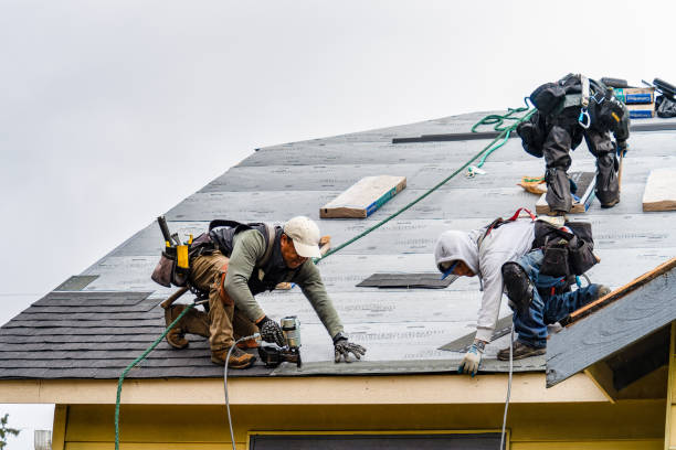 Professional Gutter Installation technician working in Waterford, MI